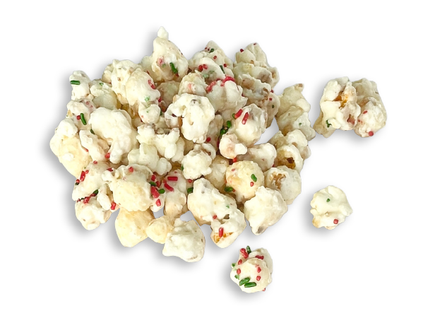 White popcorn with red and green seasoning on a plain white background
