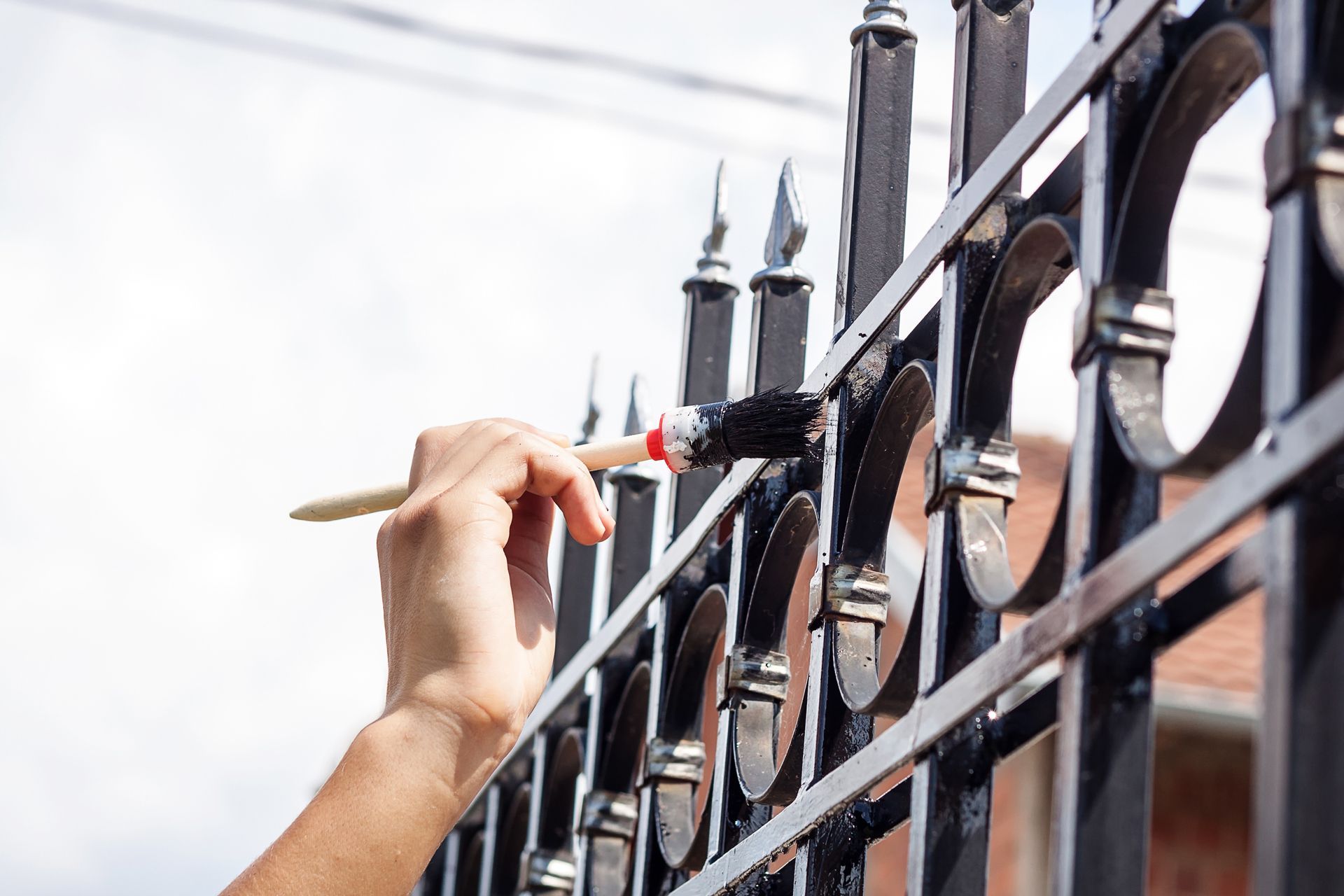 Painting Metal Fence
