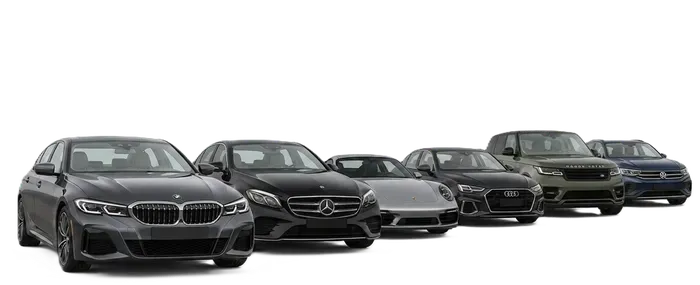 Five dark luxury sedans and SUVs lined up on a white background