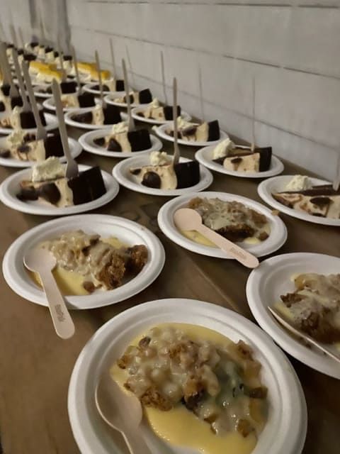 A Row Of Plates Of Food With Spoons On A Table — Tru Blu Catering In Port Macquarie, NSW
