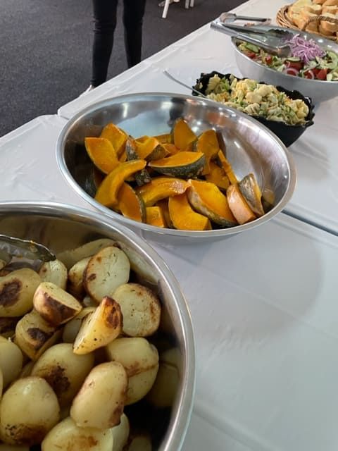 Two Bowls Of Potatoes And Pumpkin Are On A Table — Tru Blu Catering In Laurieton, NSW
