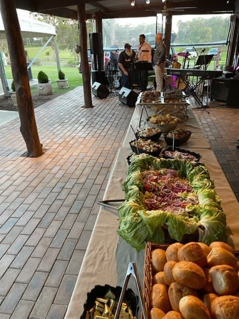 A Buffet Table With A Lot Of Food On It — Tru Blu Catering In Laurieton, NSW
