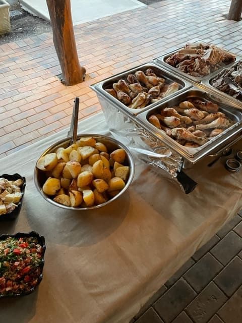 A Buffet Table With A Bowl Of Potatoes On It — Tru Blu Catering In Nambucca, NSW