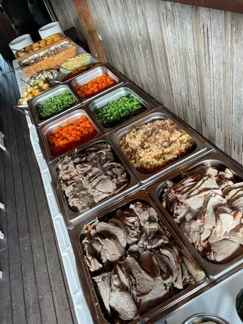 A Buffet Table With A Variety Of Meats And Vegetables — Tru Blu Catering In Kempsey, NSW