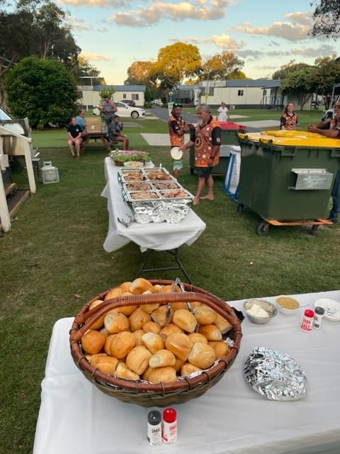 A Table With A Basket Of Bread On It — Tru Blu Catering In Port Macquarie, NSW