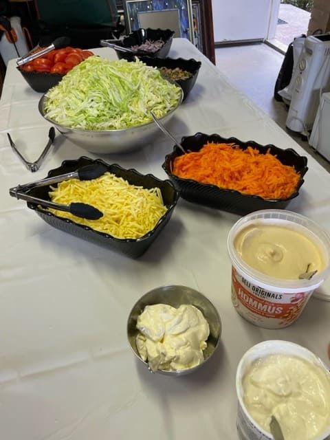 A Table Topped With Bowls Of Food Including A Tub Of Ranch Dressing — Tru Blu Catering In Port Macquarie, NSW