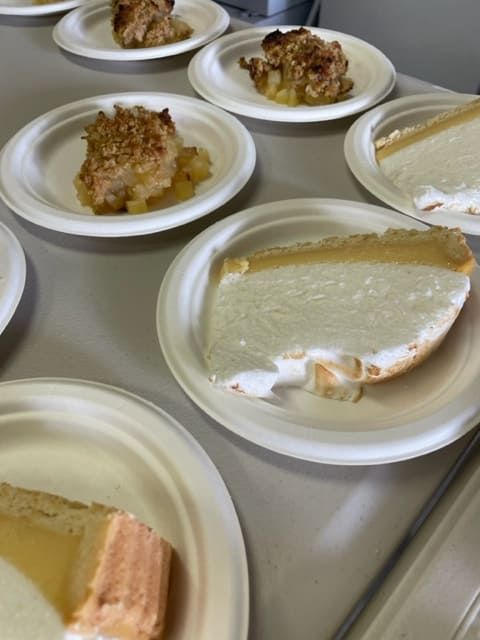 Several Plates Of Food On A Table Including A Slice Of Pie — Tru Blu Catering In Port Macquarie, NSW