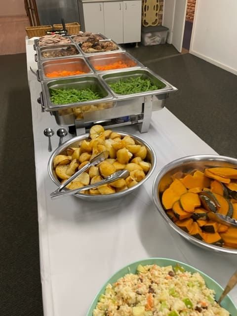 A Buffet Table With Bowls Of Food On It — Tru Blu Catering In Port Macquarie, NSW