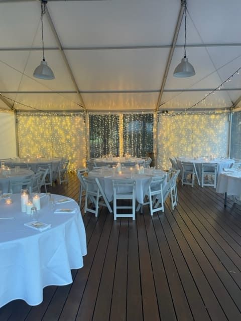 A Large Room With Tables And Chairs Set Up For A Wedding Reception — Tru Blu Catering In Port Macquarie, NSW