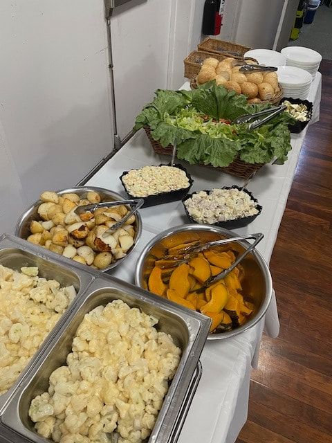A Buffet Table With A Variety Of Food On It — Tru Blu Catering In Taree, NSW