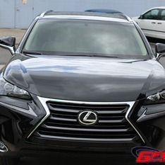 Front view of a black Lexus SUV parked outdoors