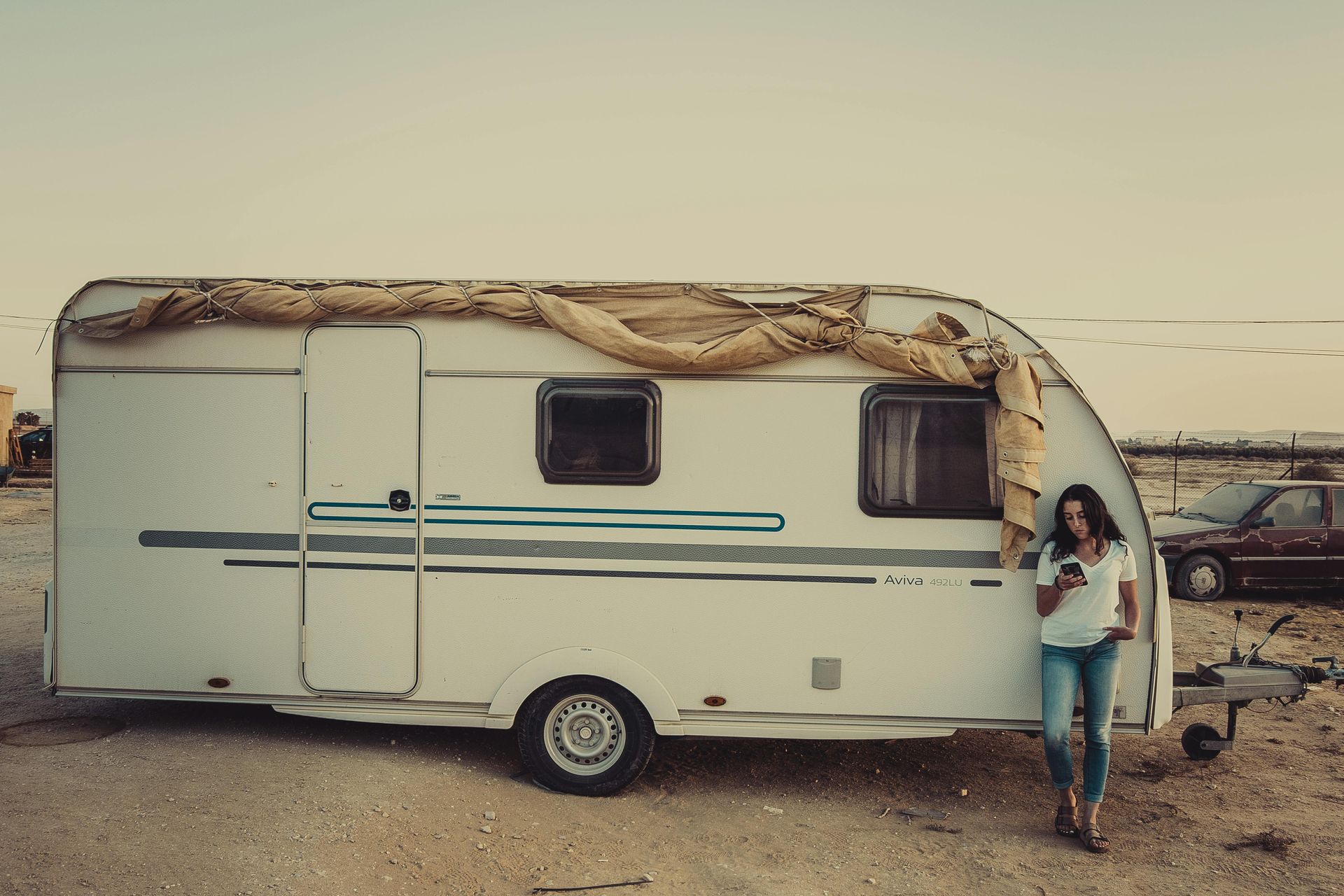 RV parked in outdoor storage