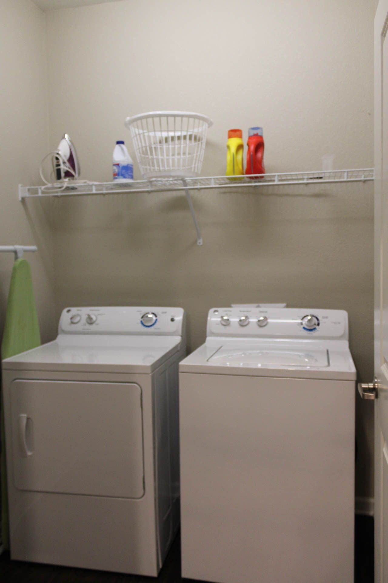 There is a washer and dryer in the laundry room.