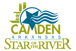 Logo for Camden, Arkansas featuring a green steamboat, a blue star, stylized river waves, and text in green and blue.