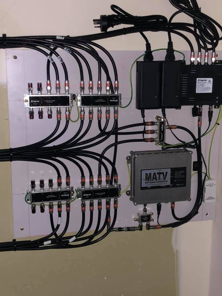 Network and Power Distribution Panel With Bundled Black Cables — MATV Systems Australia Pty Ltd in Wickham, NSW