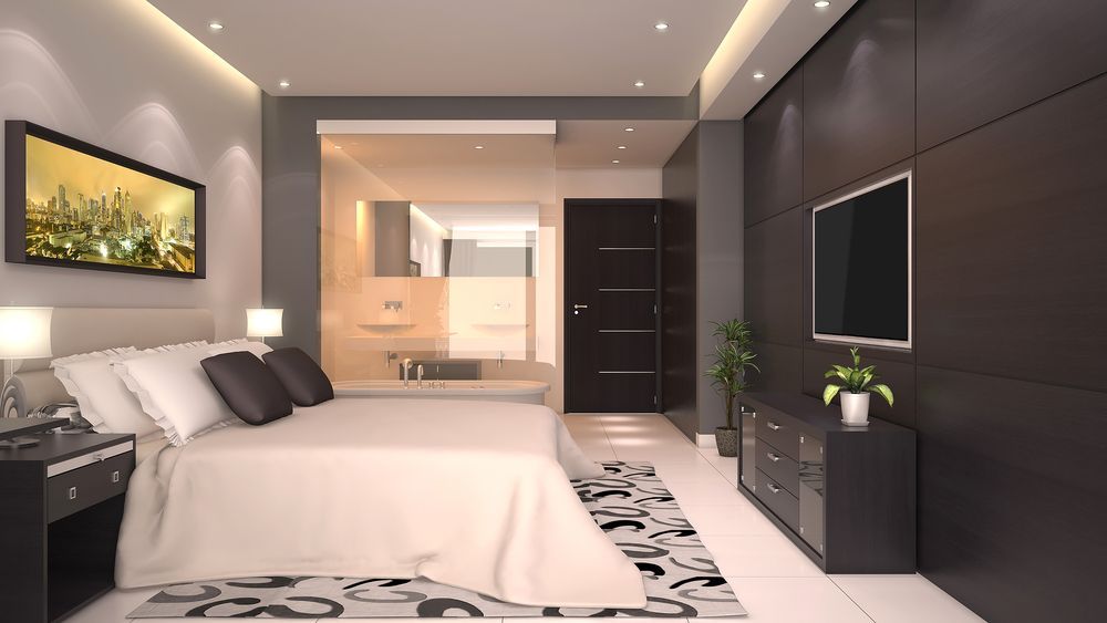 Modern Bedroom With White Bed and TV — MATV Systems Australia Pty Ltd in Wickham, NSW