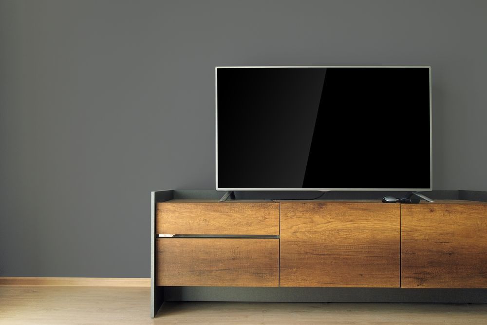 Modern TV on a Wooden Media Console — MATV Systems Australia Pty Ltd in Wickham, NSW