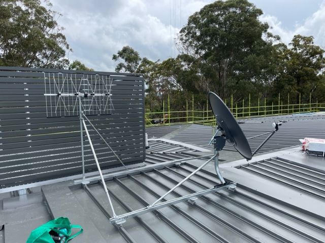 Rooftop With Satellite Dishes — MATV Systems Australia Pty Ltd in Wickham, NSW