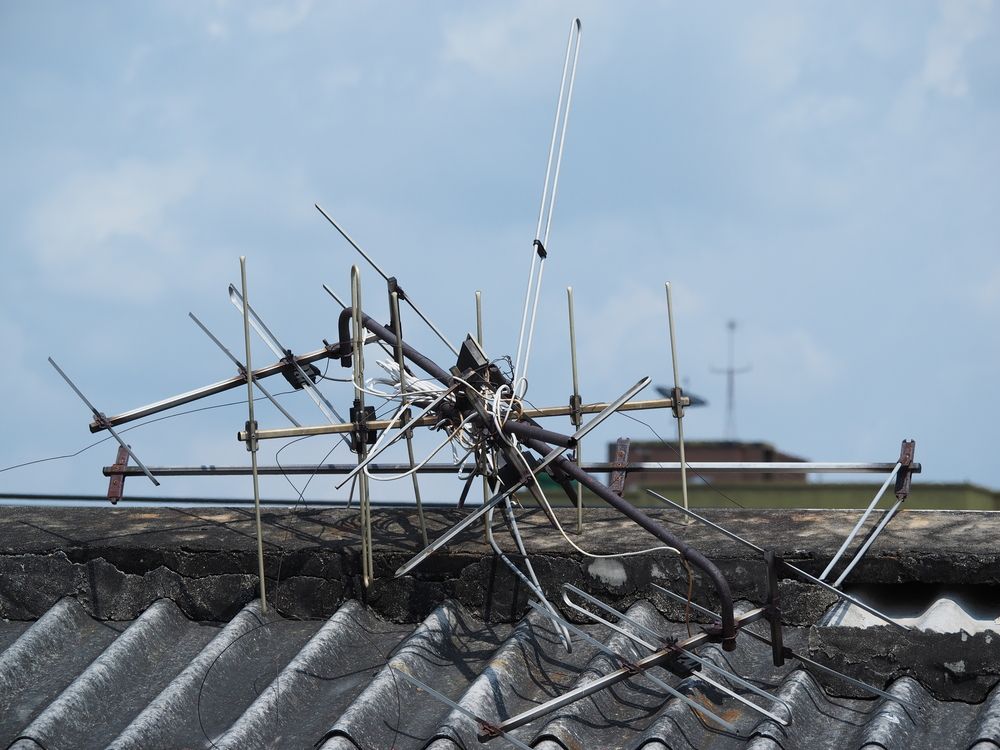 Roof-mounted TV Antenna With Tangled Wires — MATV Systems Australia Pty Ltd in Wickham, NSW