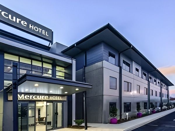 A Large Building with A Sign that Says Mercure Hotel — MATV Systems Australia Pty Ltd in Wickham, NSW