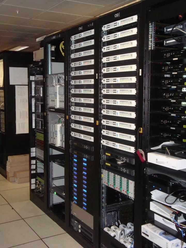 A Row of Server Racks in A Server Room — MATV Systems Australia Pty Ltd in Central Coast, NSW