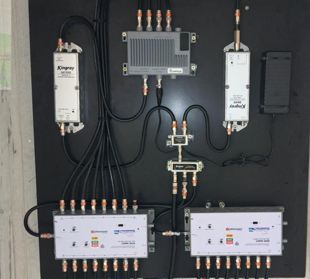 A Bunch of Wires Are Plugged Into a Wall Socket — MATV Systems Australia Pty Ltd in Central Coast, NSW