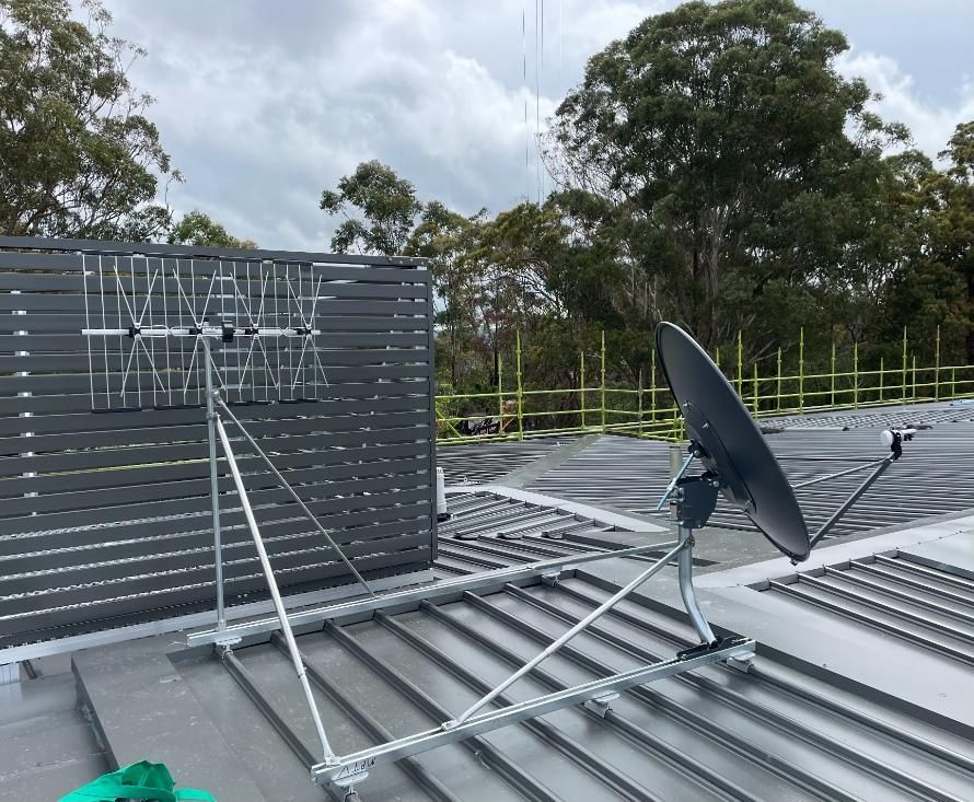 A Satellite Dish Is Sitting on Top of A Roof — MATV Systems Australia Pty Ltd in Wickham, NSW