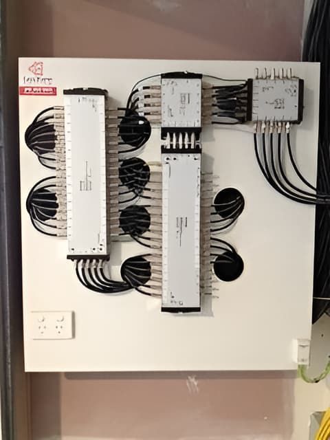 A White Board with A Bunch of Wires on It — MATV Systems Australia Pty Ltd in Wickham, NSW
