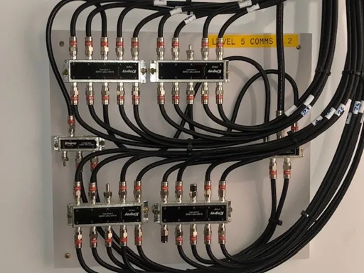 Electrical Panel With Rows of Black Relays — MATV Systems Australia Pty Ltd in Wickham, NSW