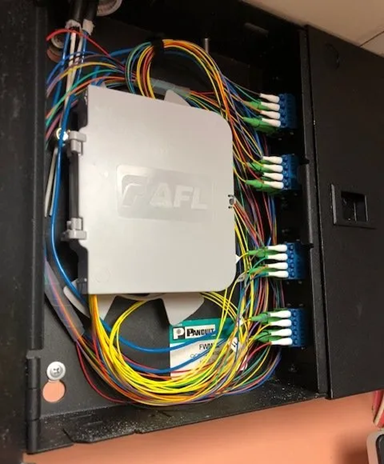 Open Network Cabinet With BundledCables and AFL Panel Inside — MATV Systems Australia Pty Ltd in Wickham, NSW