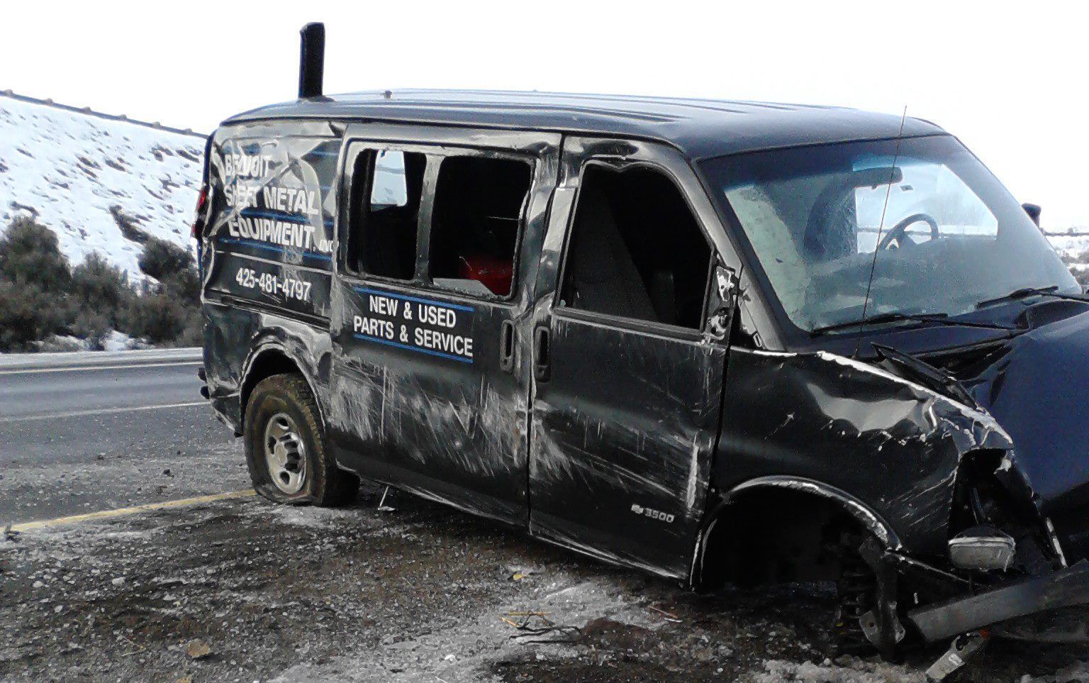 A black van with the word plumbing on it