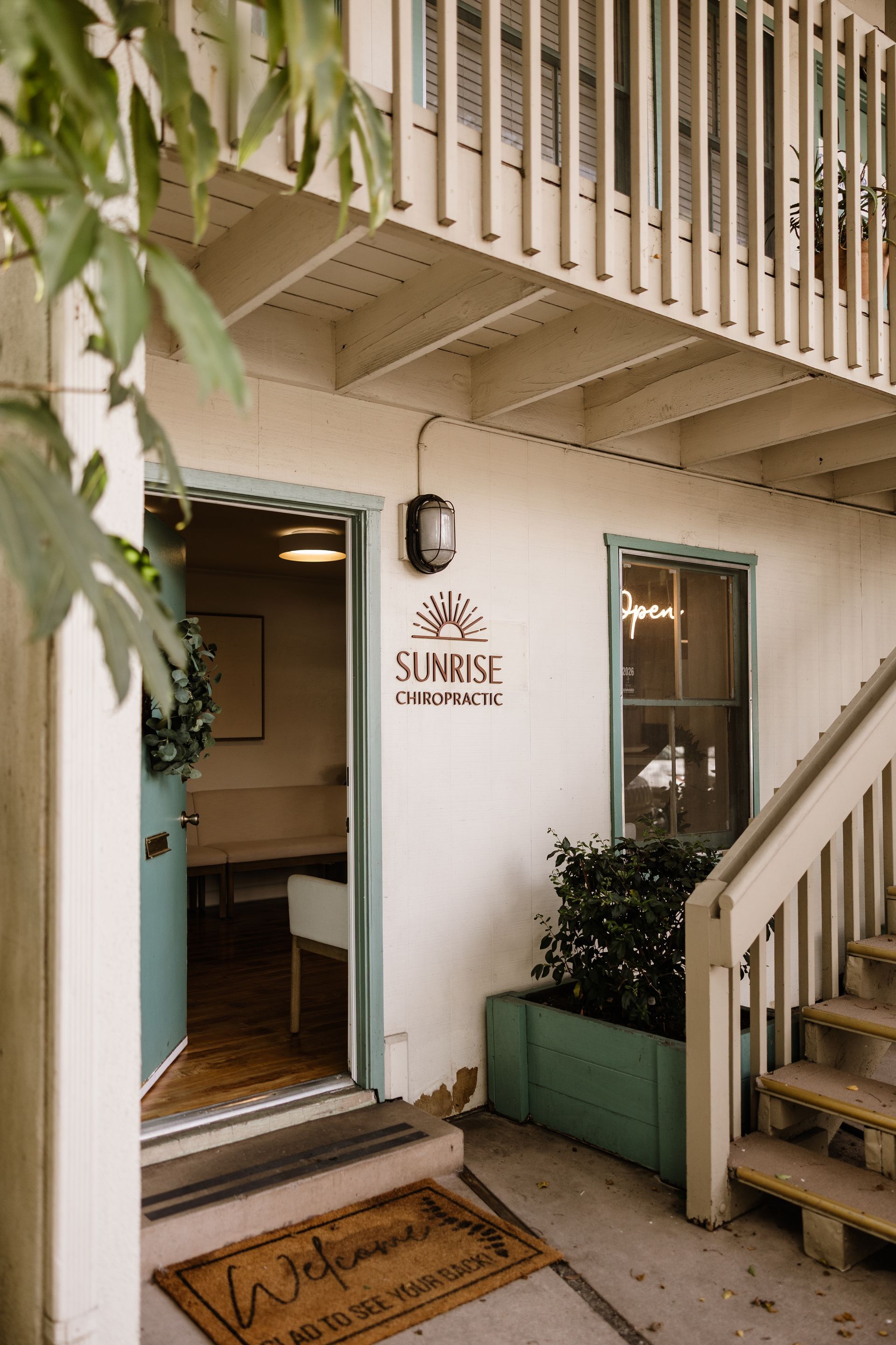 The outside of the office door for Sunrise Chiropractic.