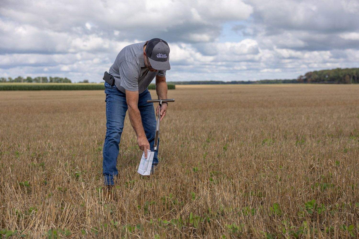 Brad Rocke doing soil sampling