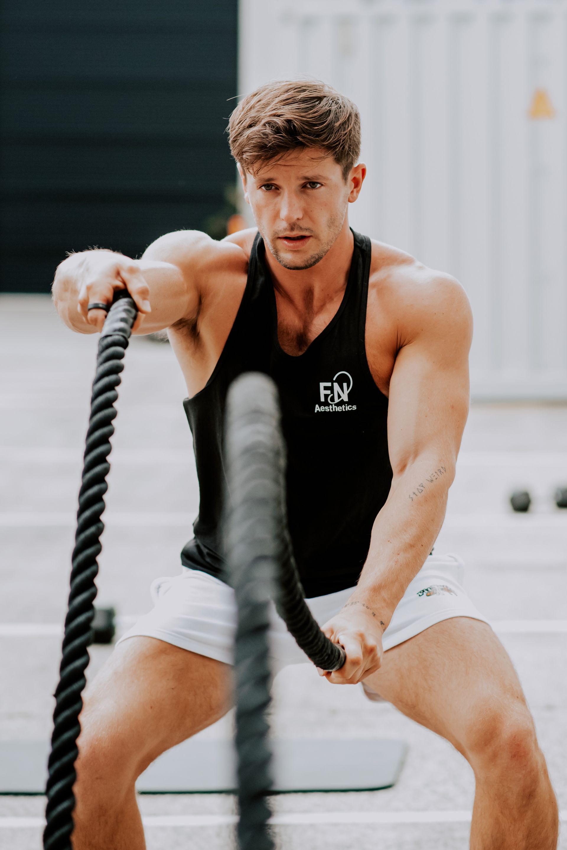 ManuXtrain working out with ropes.