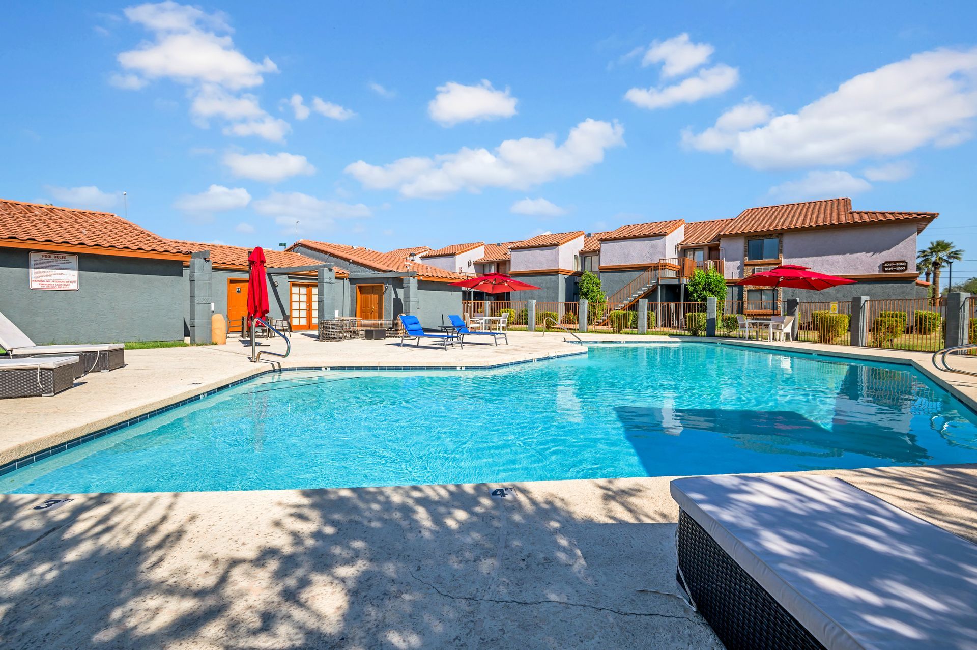 resort-style pool with cabanas and a spa