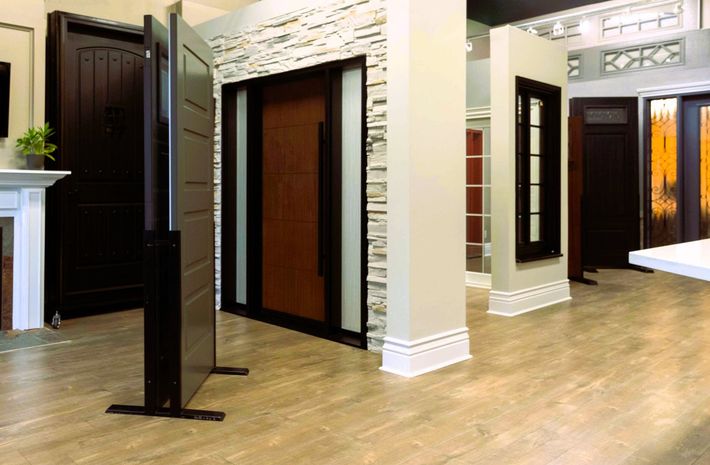 A showroom filled with lots of doors and windows.