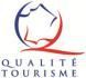 C'est un logo pour une entreprise qui s'appelle qualité tourisme.