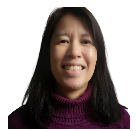 Woman smiling, wearing a dark purple turtleneck. Black hair, against a white background.