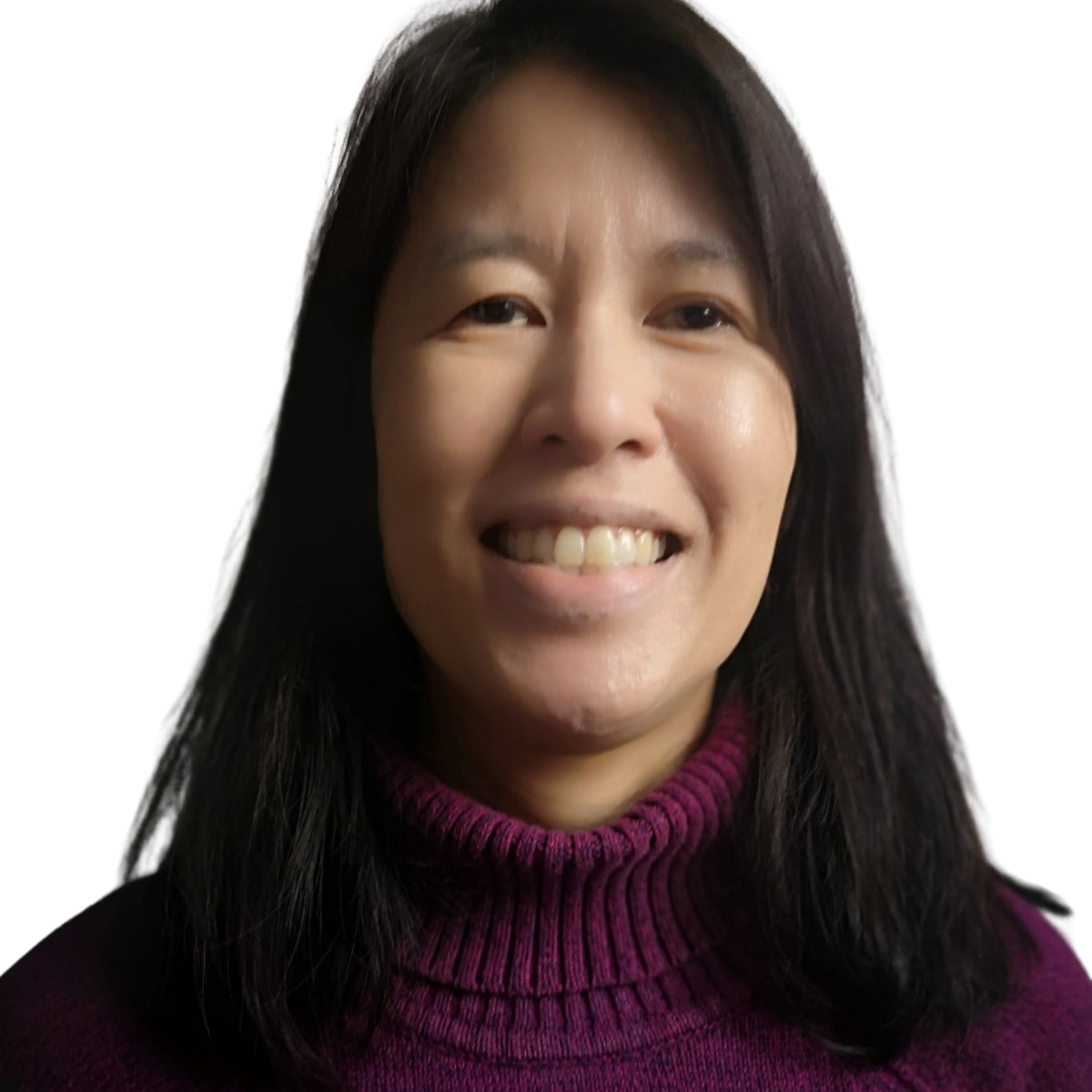 Woman in a purple sweater smiles with black hair against a white backdrop.