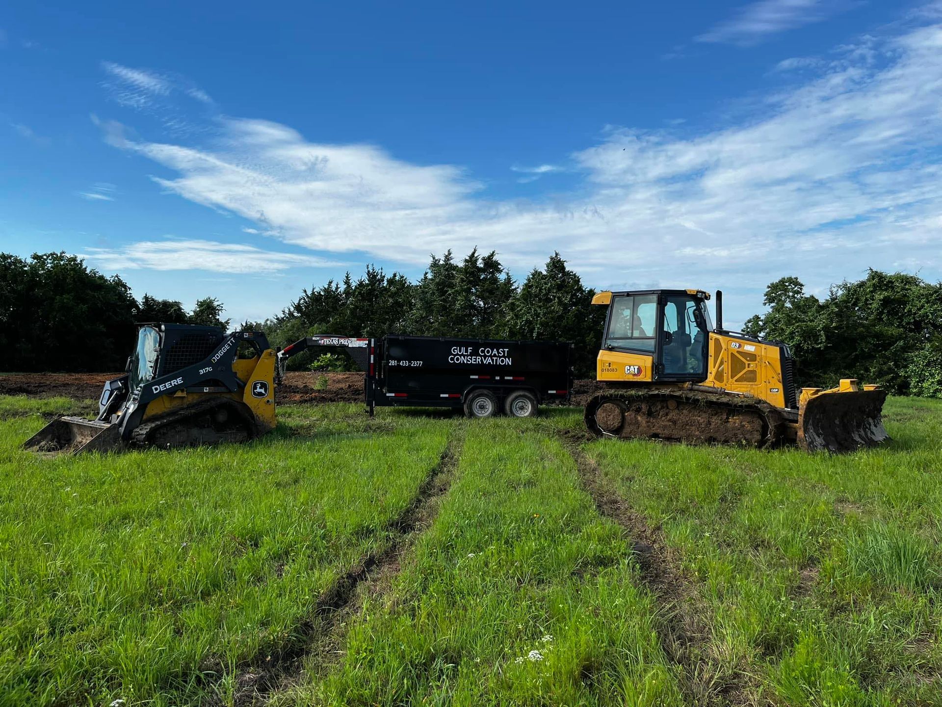 Gulf Coast Conservation equipment building a road and pad construction project in Texas