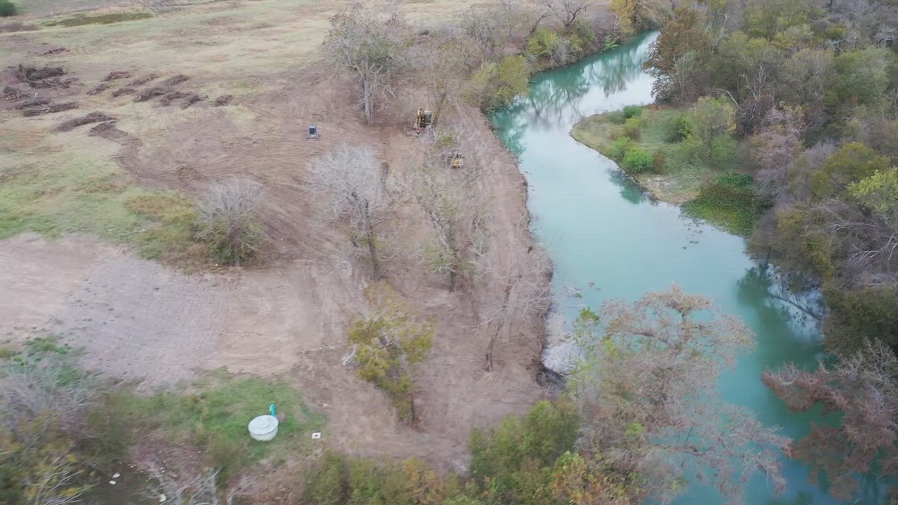 Gulf Coast Conservation equipment working on a land development project