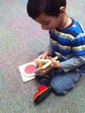 Kid Playing on Floor — Woodridge, IL — Montessori of Woodridge