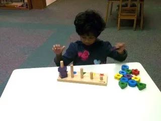 Child Playing with Numbers — Woodridge, IL — Montessori of Woodridge