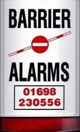 Sign for Barrier Alarms, white with red accents, featuring a barrier symbol and phone number.