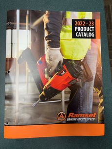 Ramset 2022–23 product catalog cover showing a worker using a red nail gun on a construction site