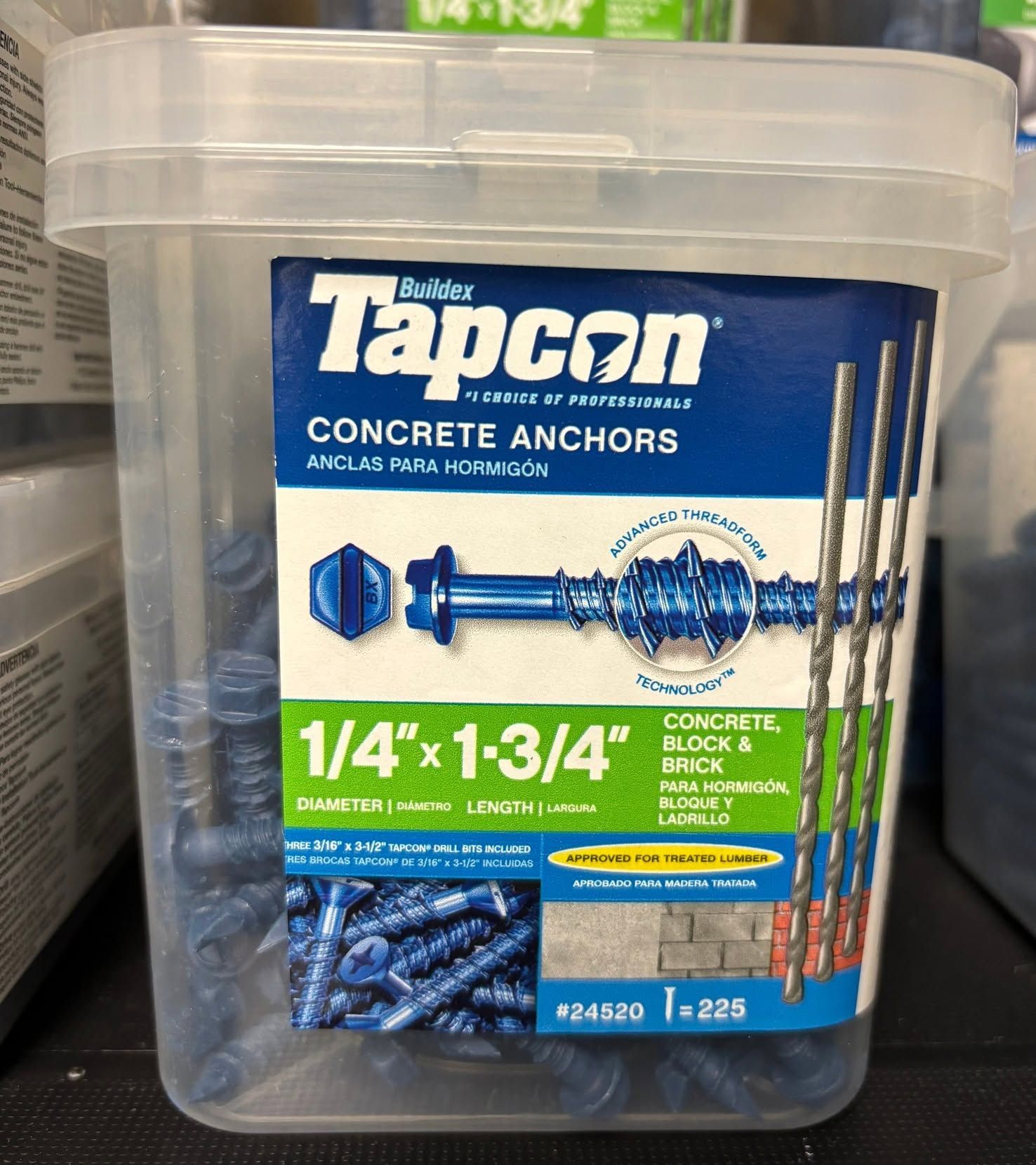 Tapcon concrete anchors in a clear plastic container with blue and green label, 1/4