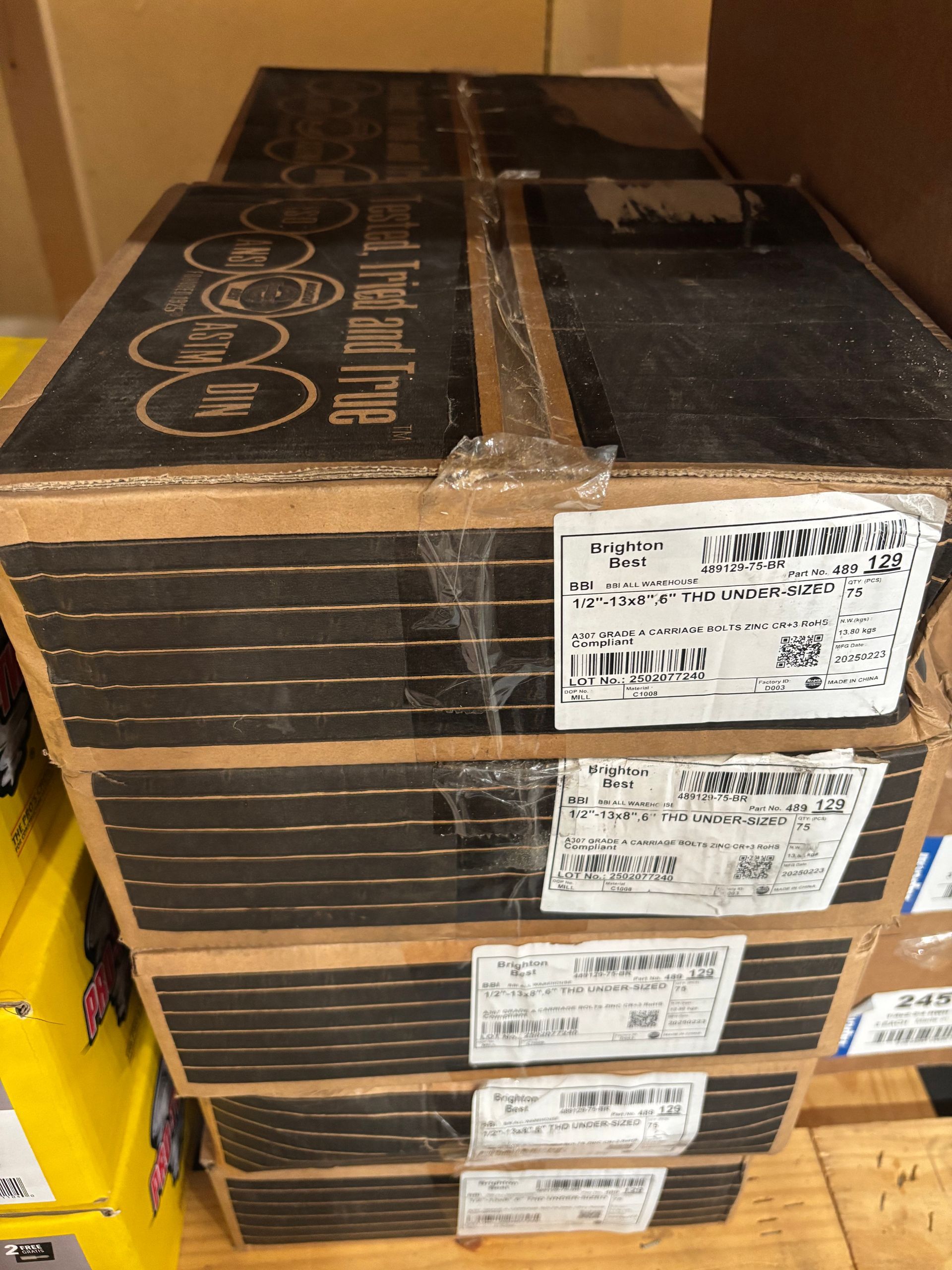 Box of Grip Rite steel stakes in brown packaging with a white band and product label