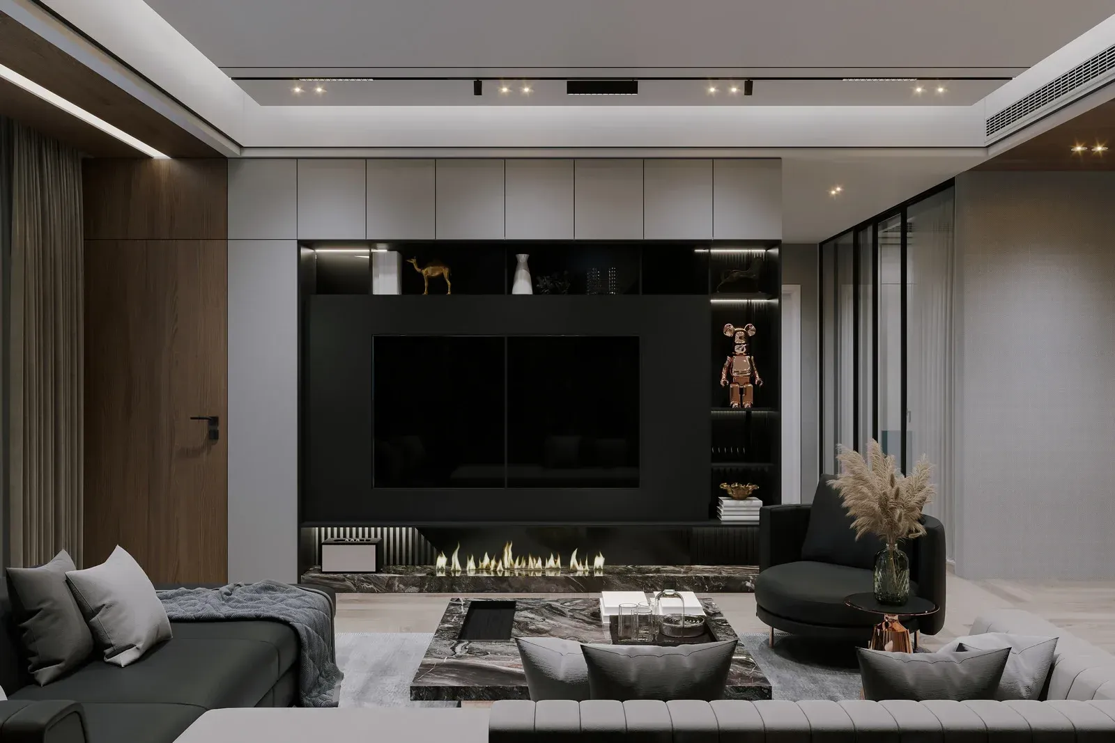 Modern gray living room with a large wall-mounted TV and built-in shelving