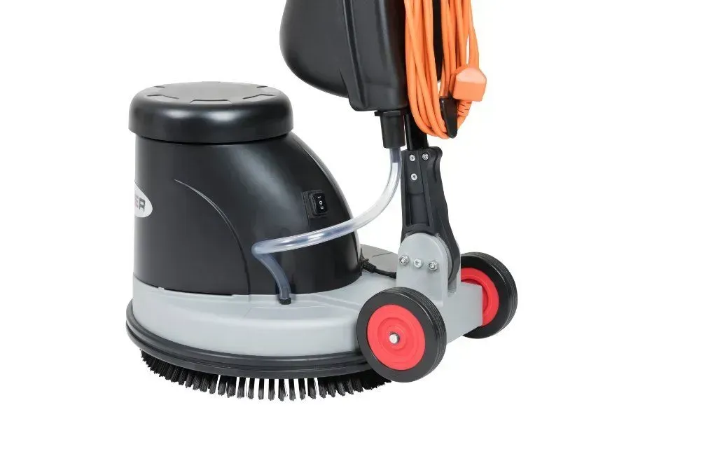 Black and gray floor buffer with red accents and orange cord.