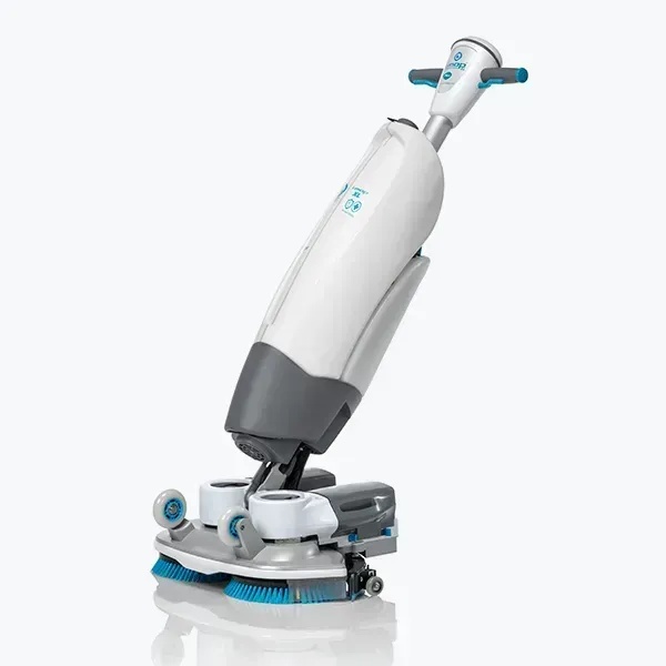 White and gray upright floor cleaner with blue brushes, angled on a white surface.
